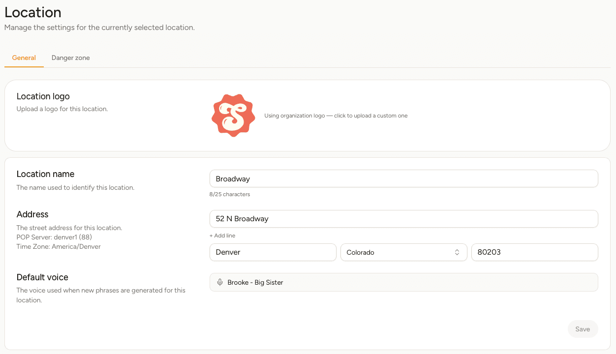 The Location settings screen with the logo, location name, address and default voice