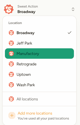 The location switcher open, listing the locations in this organization with a tick beside the current one